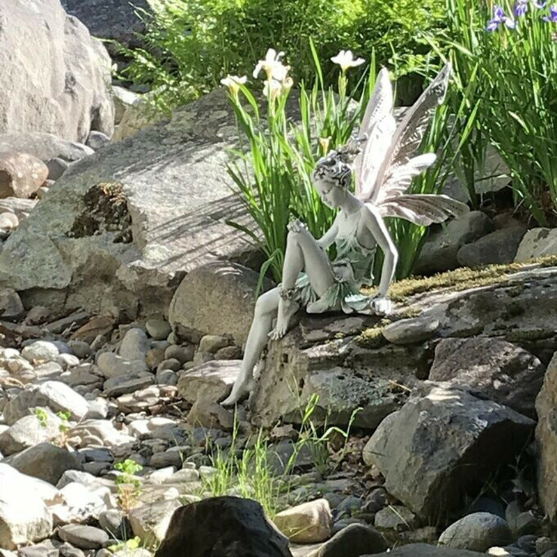 A statue of a garden fairy