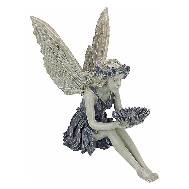 A statue of a garden fairy