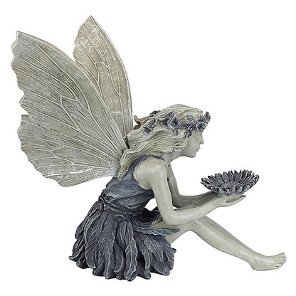 A statue of a garden fairy