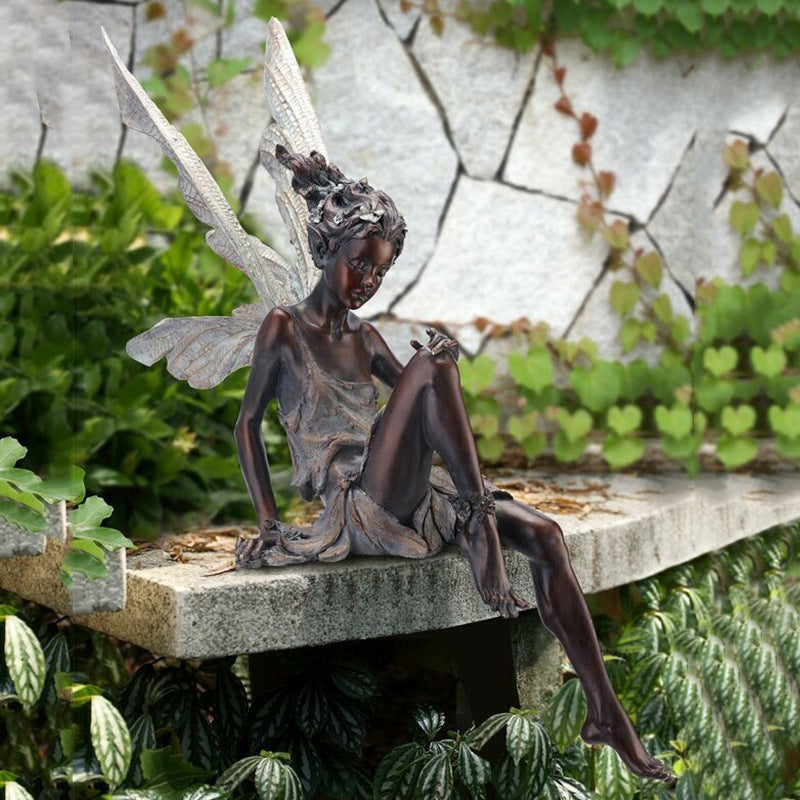 A statue of a garden fairy